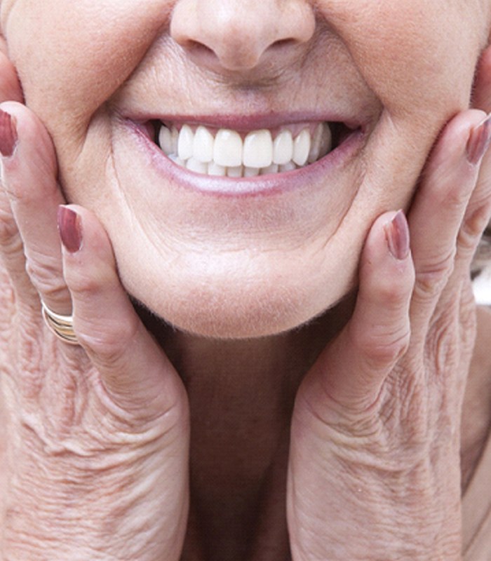 patient smiling with dentures in Jonesboro