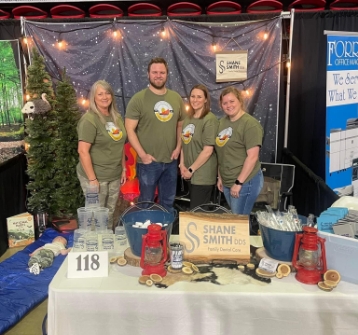 Dental team in front of Christmas display