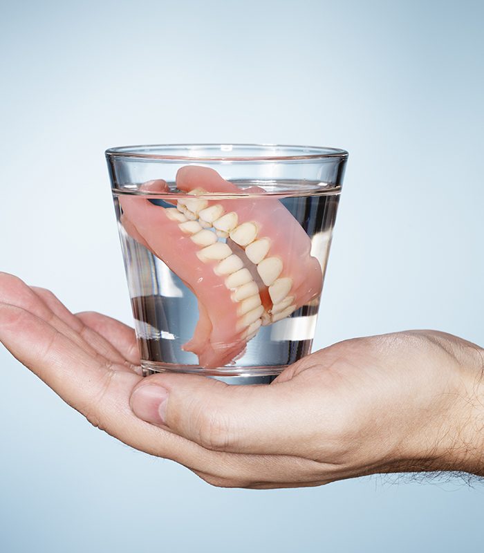 Dentures in a glass of water