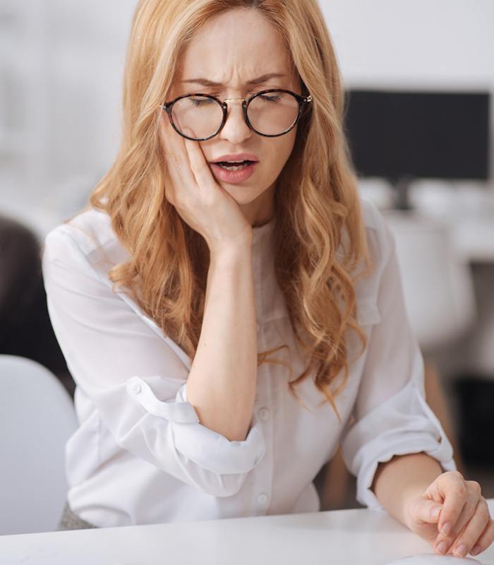 Woman at dentist for root canal therapy in Jonesboro