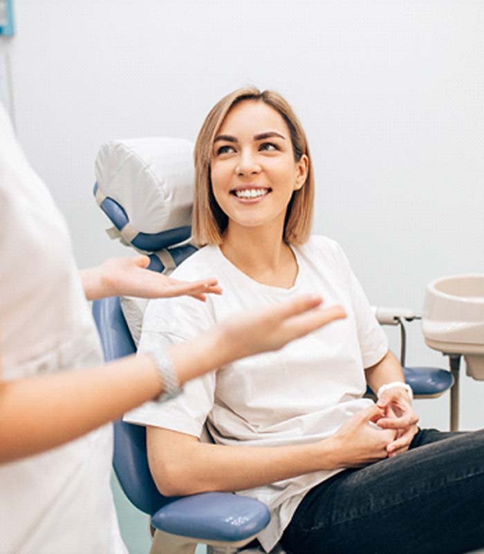 Businesswoman smiling with dental veneers in Jonesboro