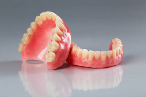 Set of upper and lower dentures