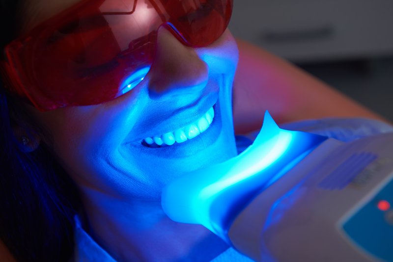 A woman having her teeth professionally whitened