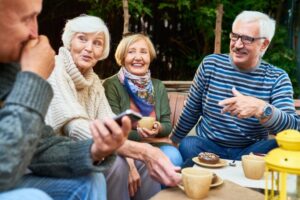 Older adults with dentures talking